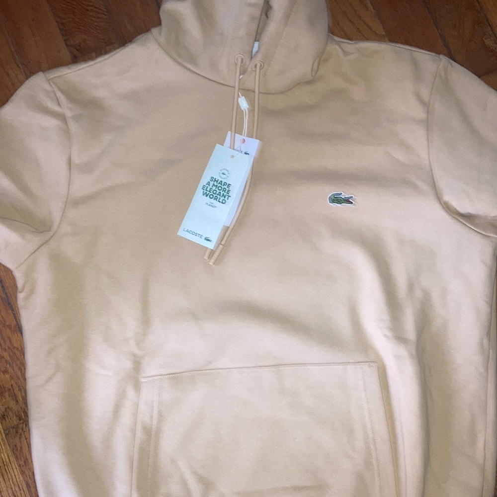 brand new, never even worn. All original tags and Lacoste logo all genuine.